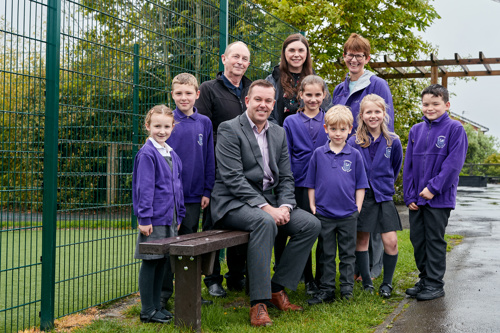 Children of Ladybrook Primary School with bench